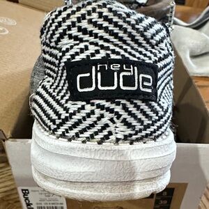 Hey Dude Women's Black and White Slip-On Woven Sneaker